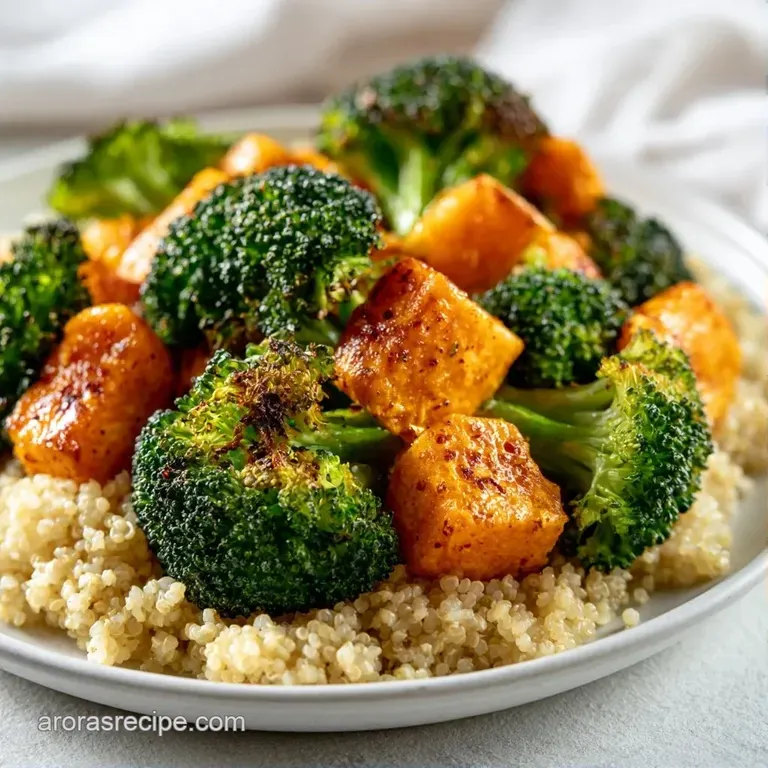 Elegant white bowl featuring fluffy quinoa, bright orange carrots, and a sprig of fresh cilantro on a linen cloth.